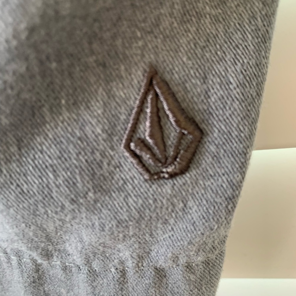 Mens Volcom gray shorts - flat front. Good condition.